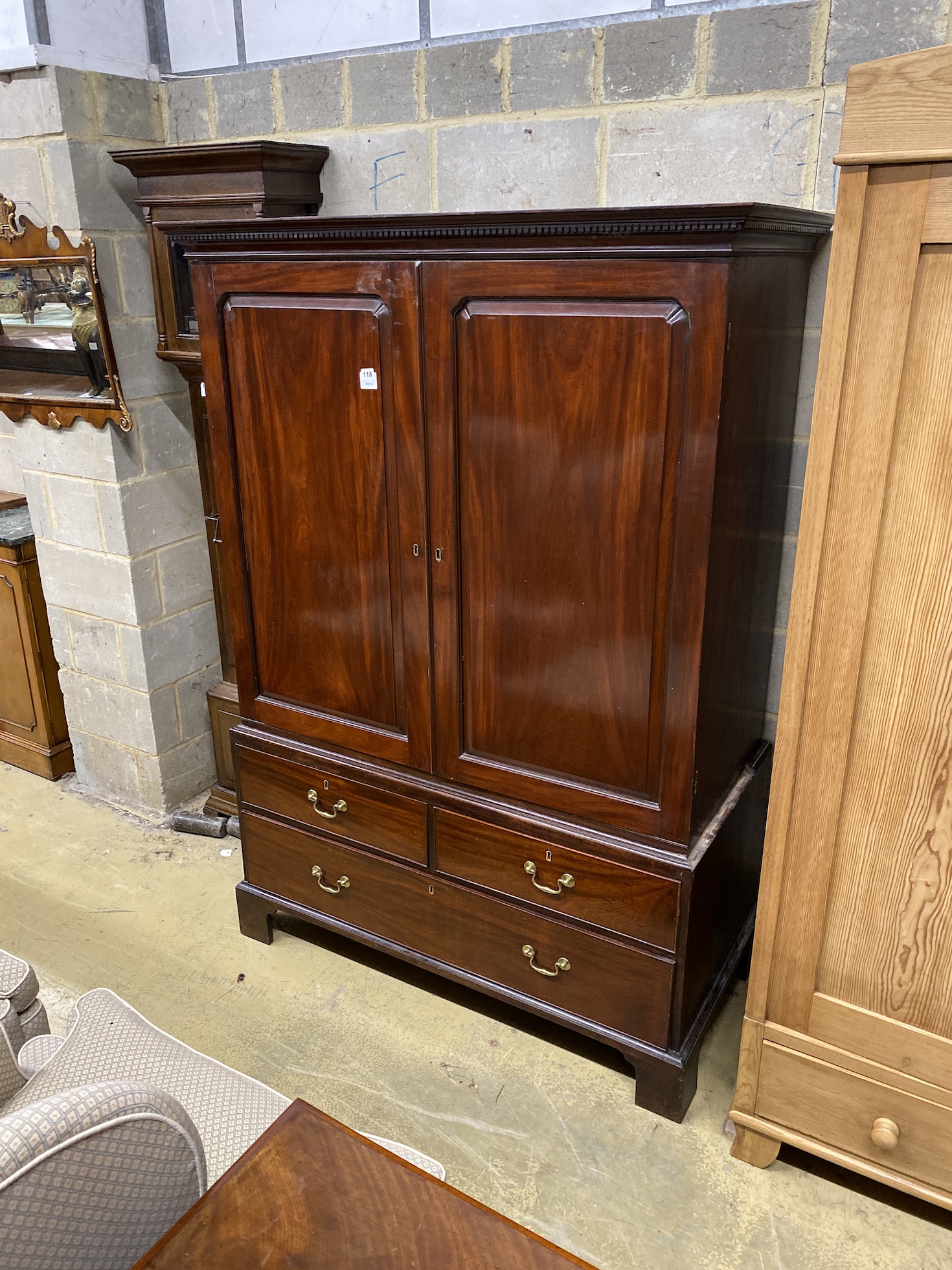 A George III mahogany linen press, width 128cm, depth 63cm, height 181cm